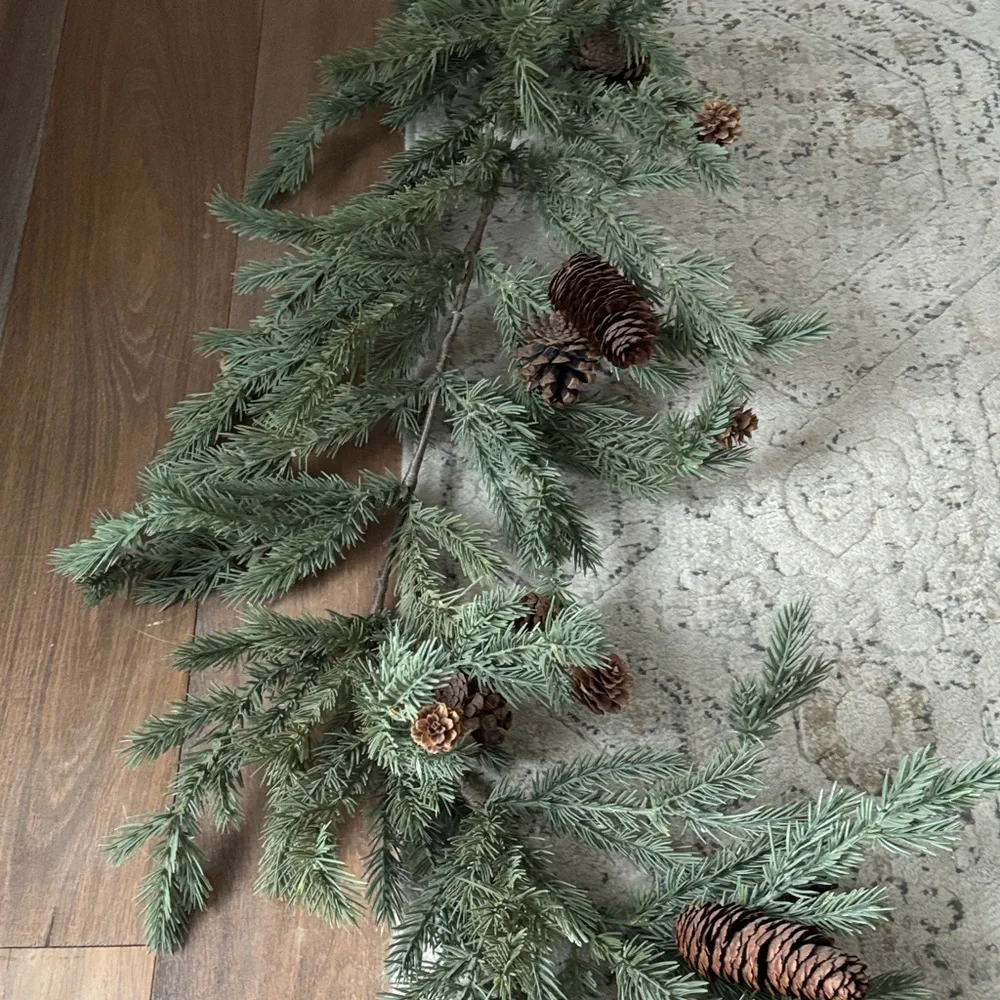 Festive Green Pine Garland with Pinecones 5ft 5ft but with stem it’s closer to 6